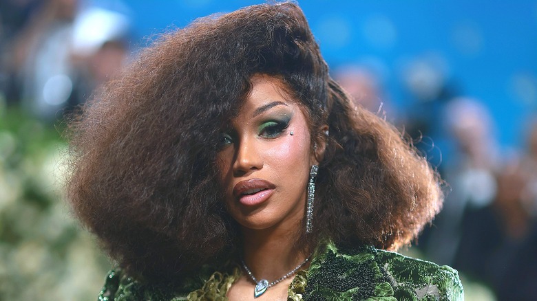 Cardi B wearing a green outfit at the Met Gala