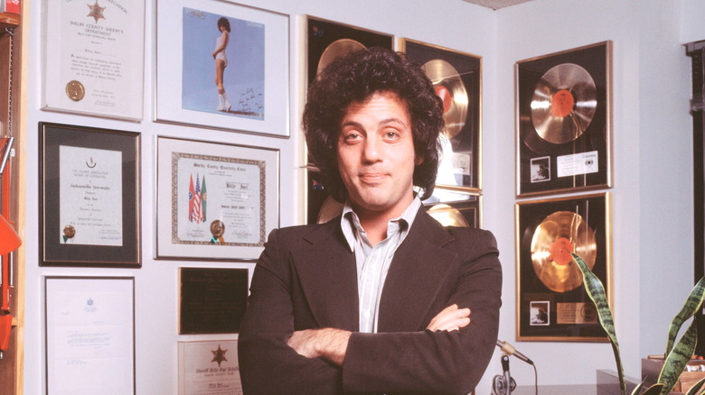 Billy Joel and his gold records