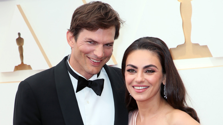 Ashton Kutcher and Mila Kunis smiling