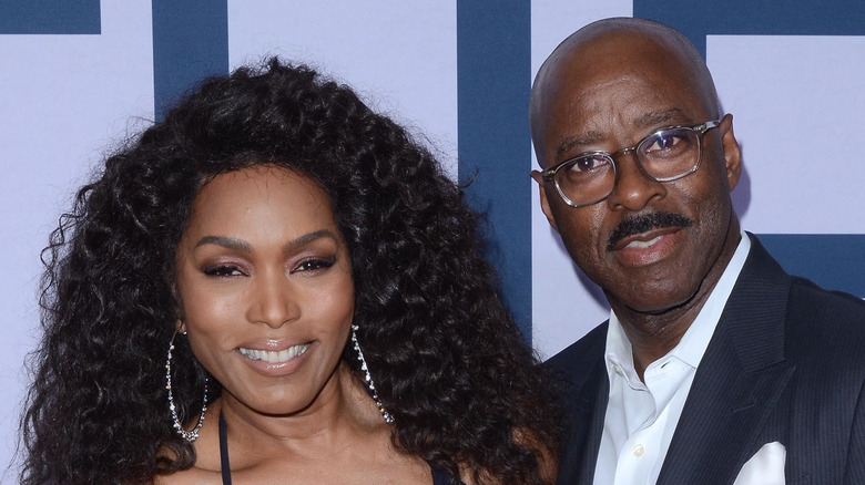 Angela Bassett posing with Courtney B. Vance