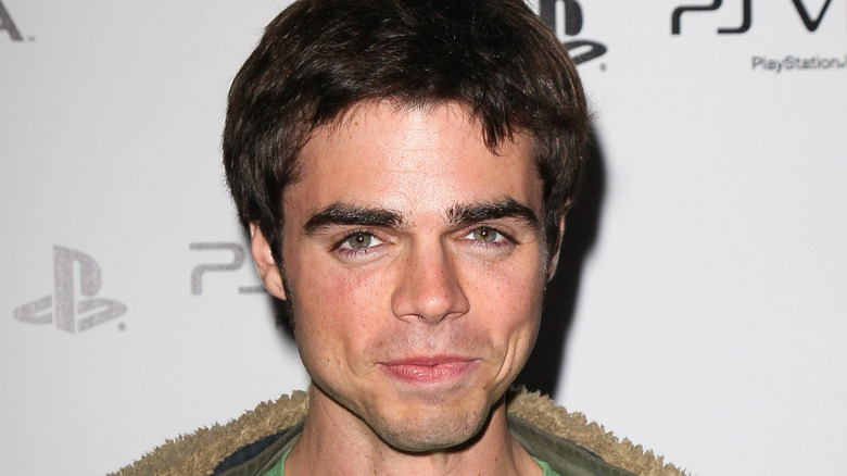 Reid Ewing posing