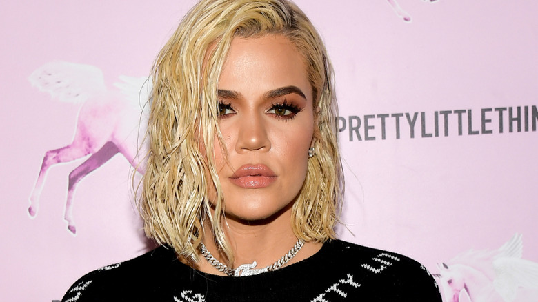 Khloé Kardashian posing