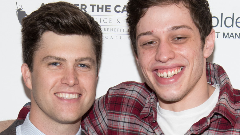 Colin Jost and Pete Davidson smiling