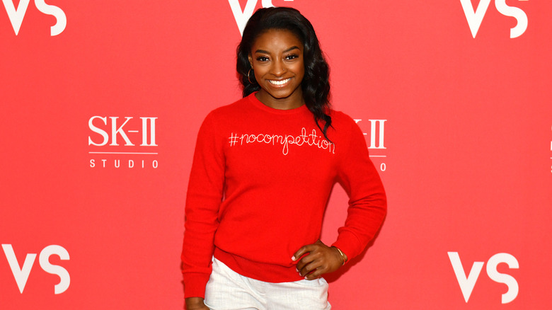 Simone Biles smiling red carpet