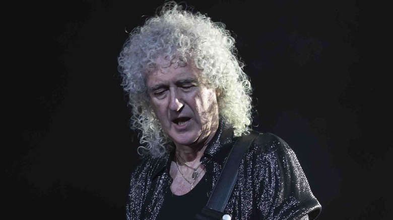 Brian May playing guitar