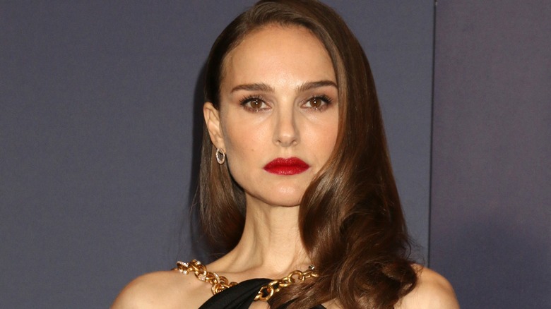 Natalie Portman posing in black gown