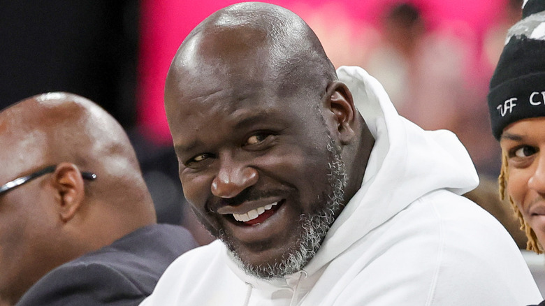 Shaquille O'Neal smiling in hoodie
