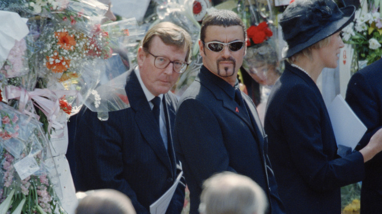 George Michael standing amongst mourners at Princess Diana's funeral