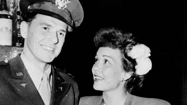Jane Wyman looking up at Ronald Reagan