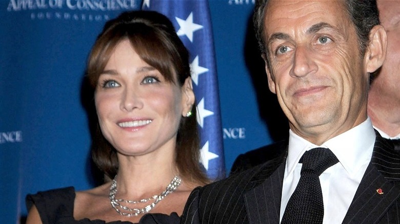 Carla Bruni, Nicolas Sarkozy smiling