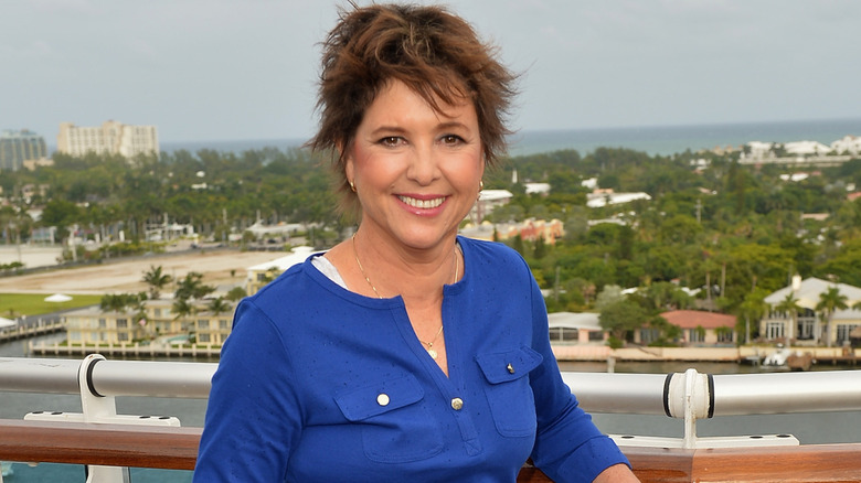 Kristy McNichol smiling on a boat