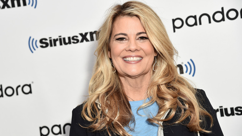 Lisa Whelchel smiling on the red carpet