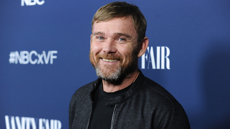 Ricky Schroder smiling on the red carpet
