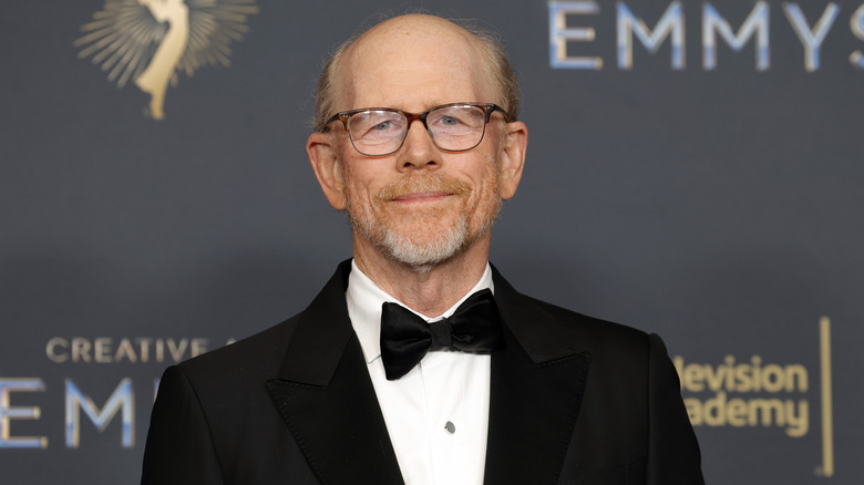 Ron Howard smirking on the red carpet at the Emmys