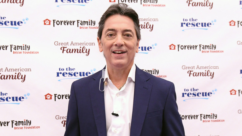 Scott Baio smiling on the red carpet