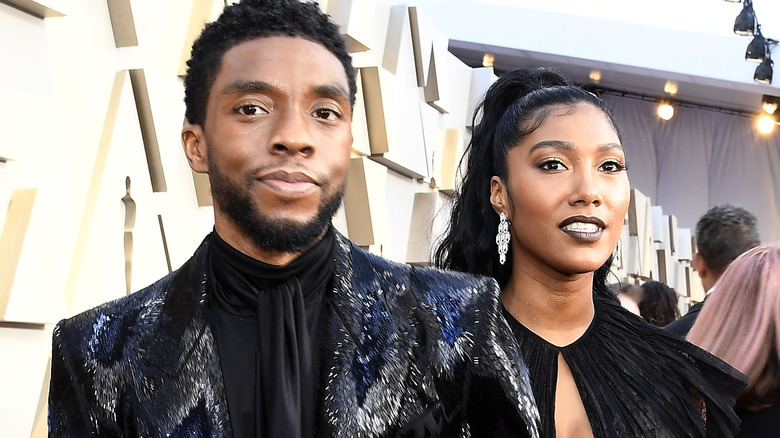 Chadwick Boseman and Simone Ledward Boseman posing