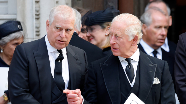 King Charles III and the former Prince Andrew talk in September 2025