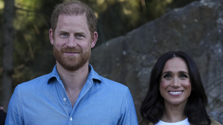 Prince Harry and Meghan Markle smiling.