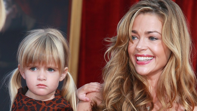 Denise Richards holding Sami Sheen
