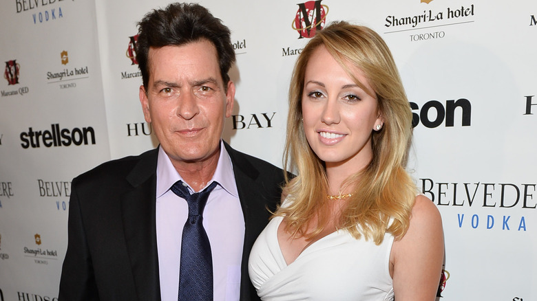 Charlie Sheen and Brett Rossi