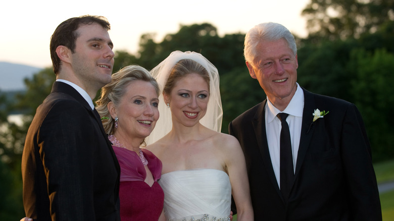 Marc Mezvinsky with Chelsea, Hillary, and Bill Clinton at their wedding in New York