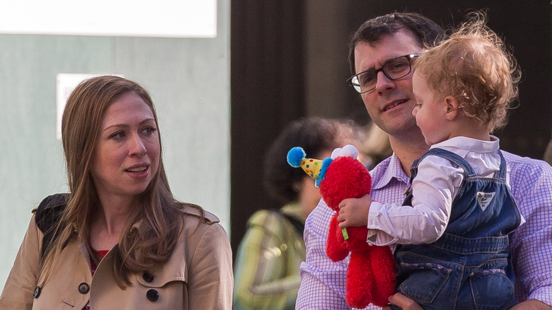 Chelsea Clinton and Marc Mezvinsky with daughter Charlotte in New York