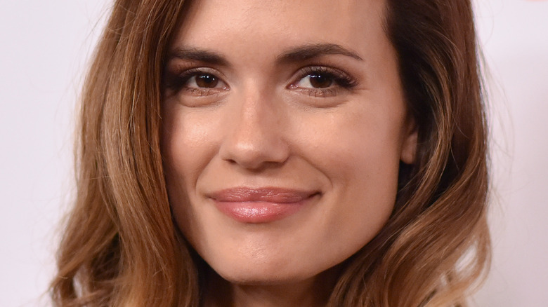 Torrey DeVitto smiling