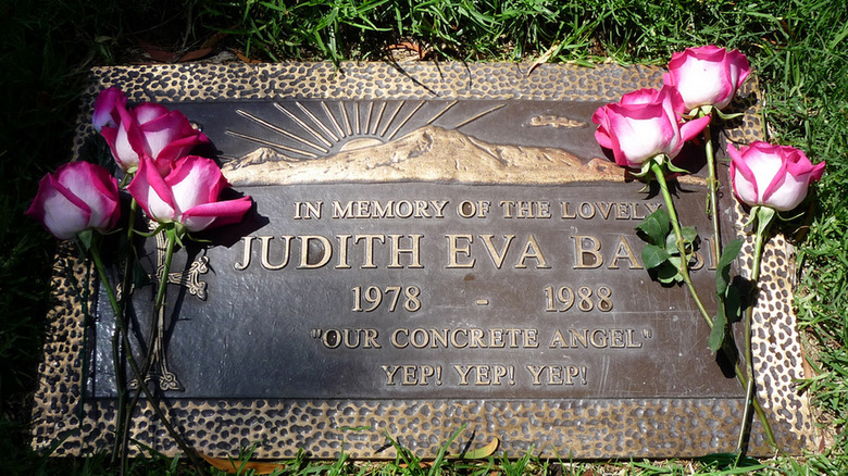 Gravestone for Judith Barsi with flowers on it