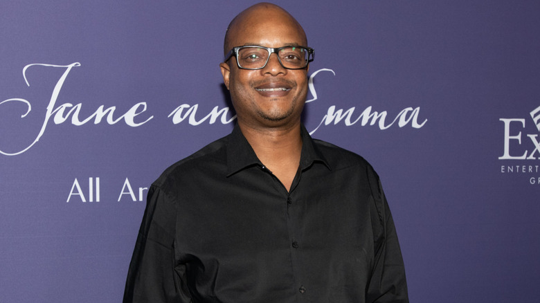Todd Bridges poses in a black shirt