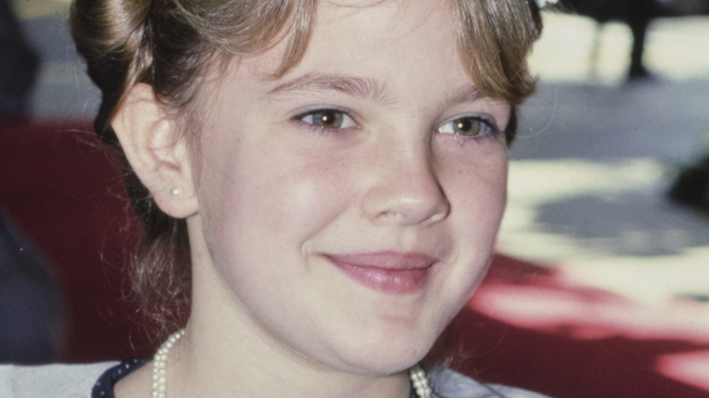 Young Drew Barrymore smiling