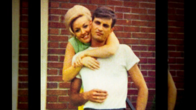 Dolly Parton hugs Carl Dean in their youth