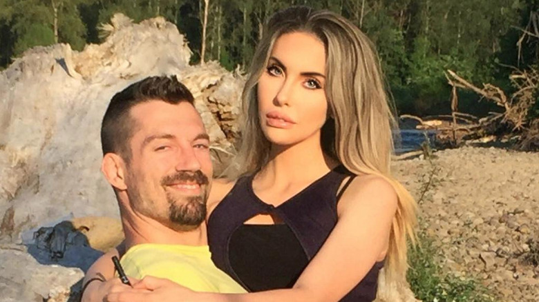 James Driskill and Chloe Lattanzi pose in the sun