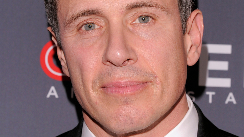 Chris Cuomo smiles at an event