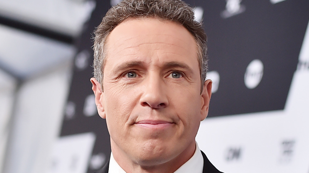 Chris Cuomo poses at event