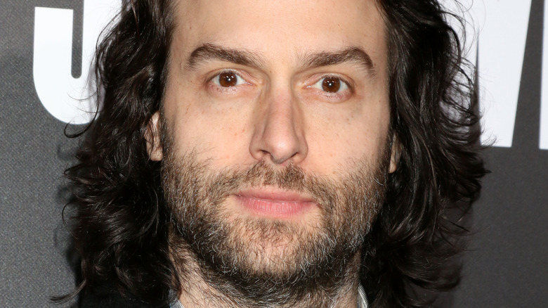 Chris D'Elia looks at camera amused