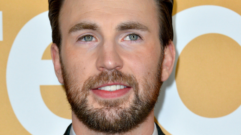 Chris Evans looking upward