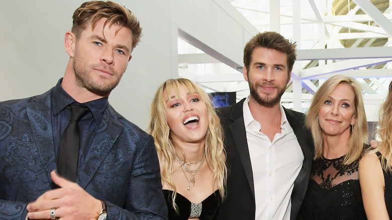 Chris Hemsworth, Miley Cyrus, Liam Hemsworth at Avengers premiere