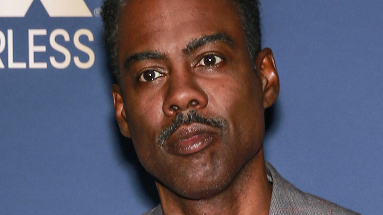 Chris Rock not smiling