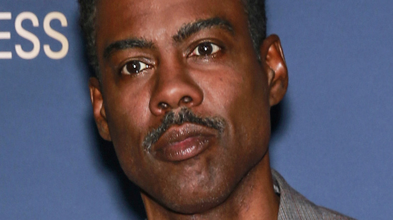 Chris Rock not smiling