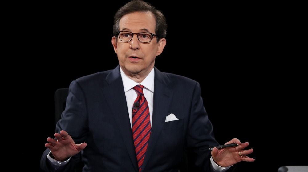 Fox News anchor and moderator Chris Wallace asks the candidates a question during the third U.S. presidential debate in 2016