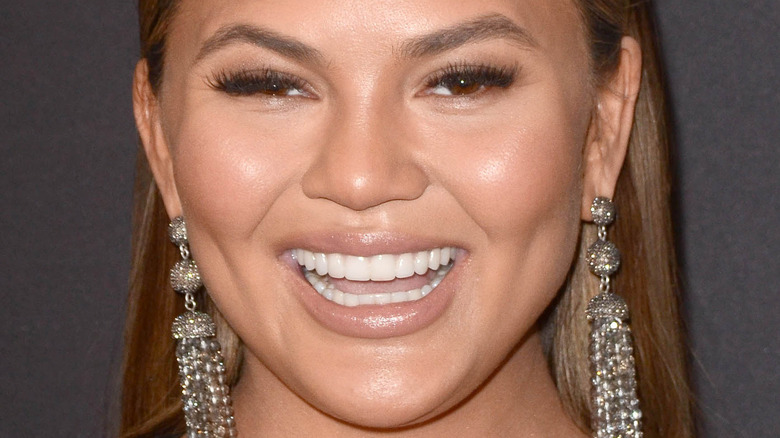 Chrissy Teigen smiling big