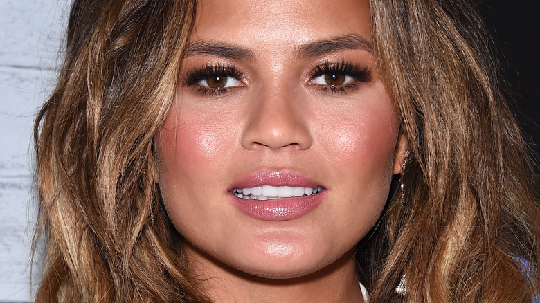 Chrissy Teigen looking into the camera