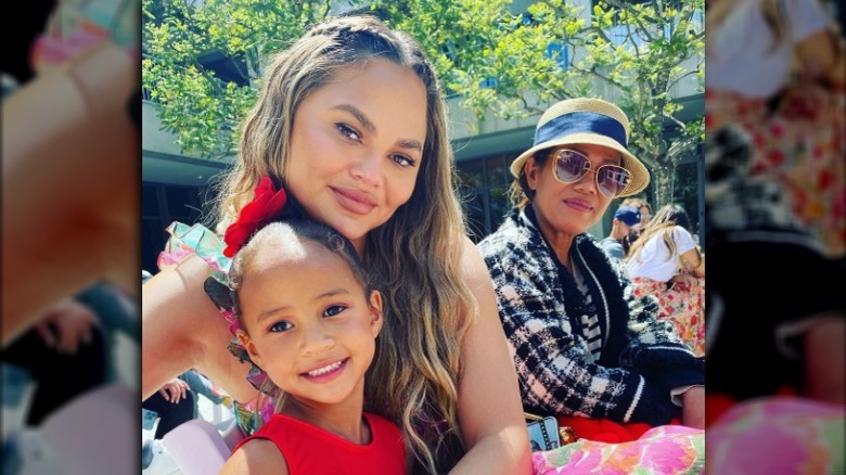 Chrissy Teigen with daughter Luna and mom Pepper at Luna's dance recital June 2021