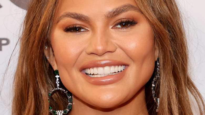 Chrissy Teigen smiling big