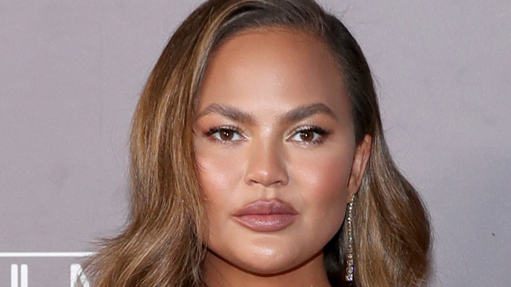 Chrissy Teigen staring at the camera