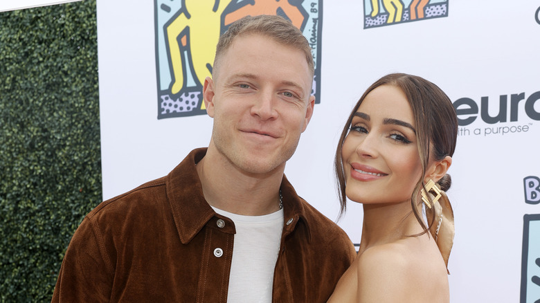 Christian McCaffrey and Olivia Culpo