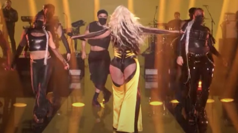 Christina Aguilera performs in chaps