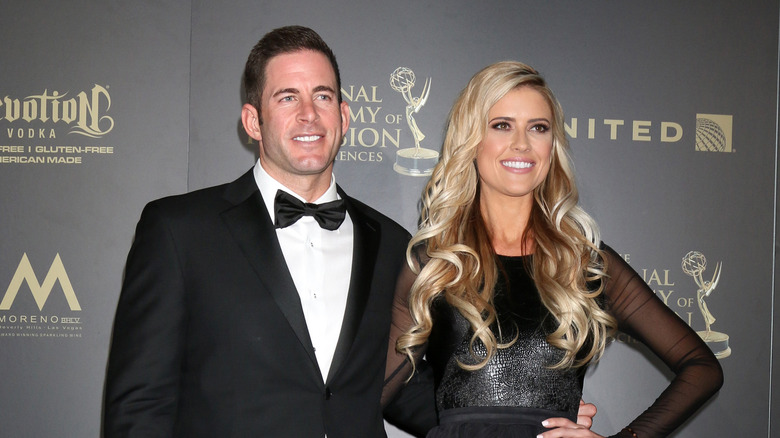 Christina Hall and Tarek El Moussa pose 