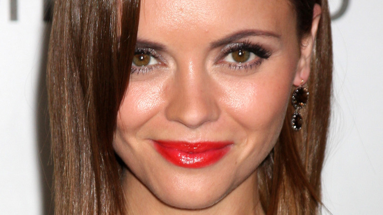 Christina Ricci poses in red lipstick 