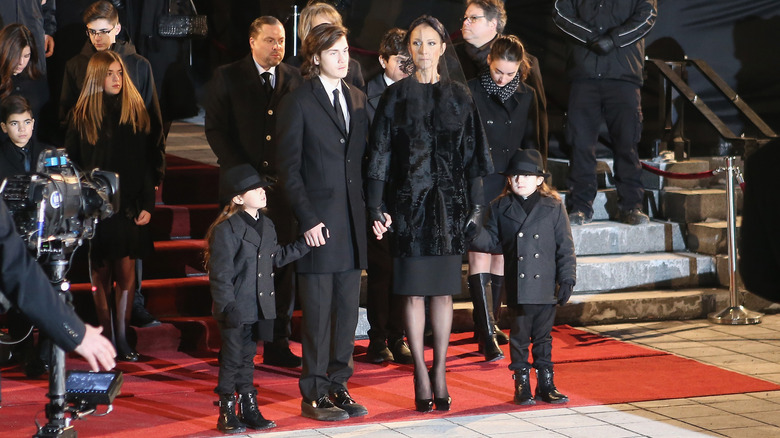 Céline Dion with her sons René-Charles, Eddy and Nelson Angélil at the funeral for her late husband Rene Angelil.